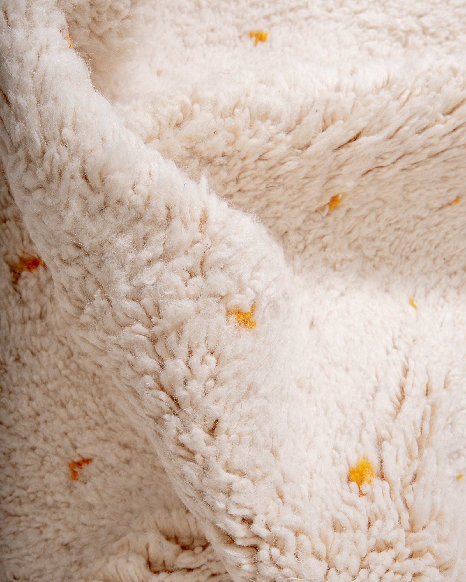 Modern, designer, handcrafted Berber rug from Morocco. Beniourain carpet with beautiful colours and patterns and fluffy wool texture.